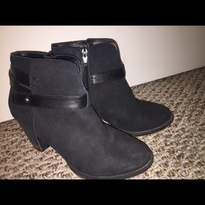 black booties with heel and belt around the ankle